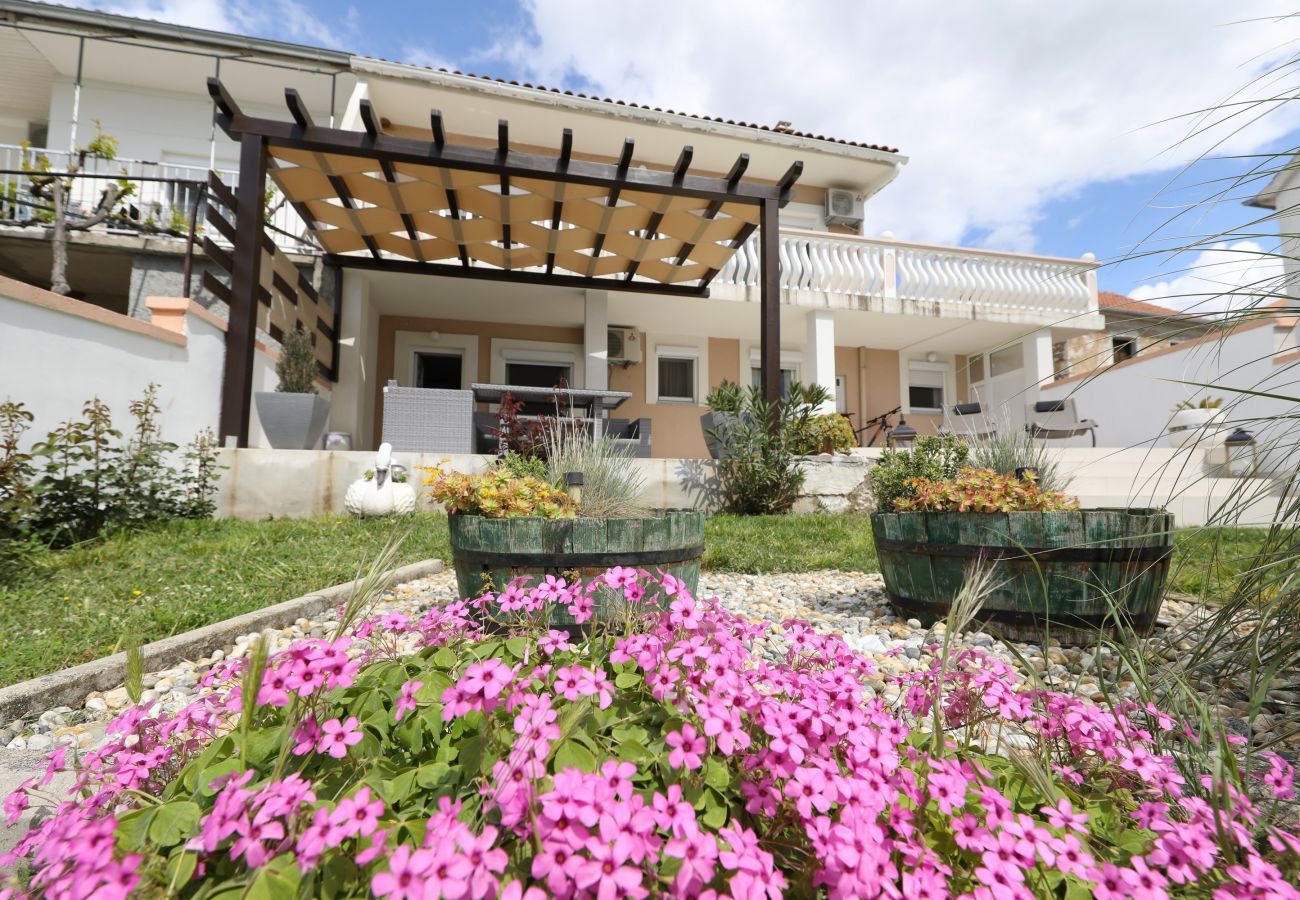 Apartment in Rovanjska - Marina, No. 1 - with garden and sea view