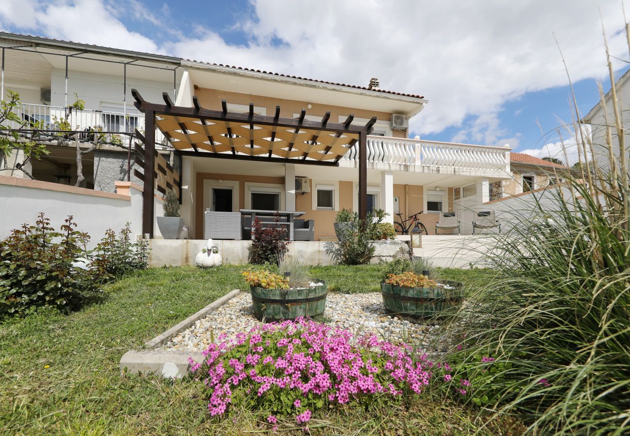 Apartment in Rovanjska - Marina, No. 1 - with garden and sea view